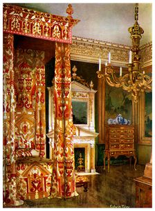 Queen Anne's bed, chest of drawers upon a stand and a wooden candelabra, 1910.Artist: Edwin Foley