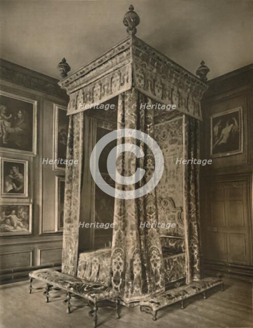 'Queen Anne's State Bedstead in Crimson and Gold Figured Velvet', 1927. Artists: Edward F Strange, Unknown.