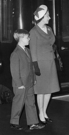Queen Elizabeth and Prince Andrew arrive at King's Cross Station, September 1968. Creator: Unknown