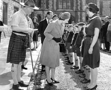 Queen Elizabeth II meeting cub scouts, St George's Day Parade, Windsor Castle, 1966. Creator: Unknown