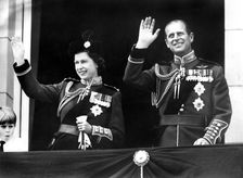 Queen Elizabeth II and Prince Philip waving from the balcony of Buckingham Palace, London, 1970