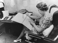 Queen Elizabeth II (b1926) flying back from Barbados on Concorde, 1977. Creator: Unknown