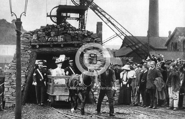 Queen Mary visiting a Welsh colliery, 1935. Artist: Unknown