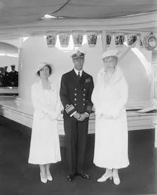 Queen Mary with the Duke and Duchess of York aboard HMY Victoria and Albert 1933. Creator: Kirk & Sons of Cowes