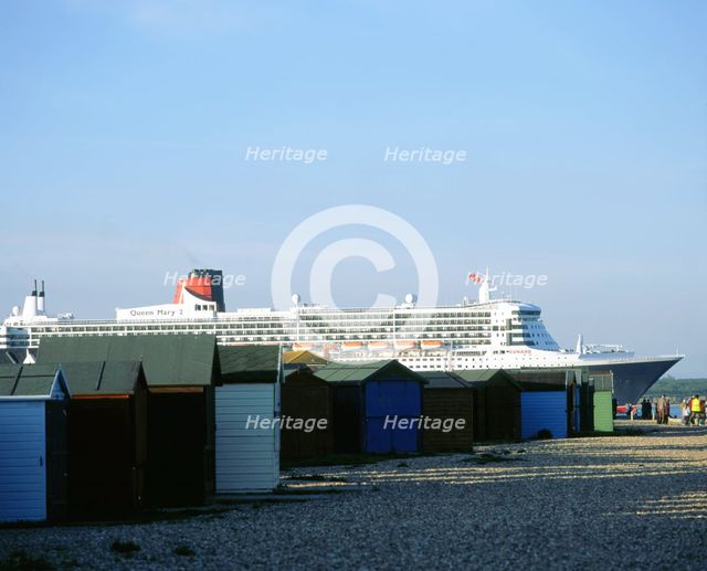 Queen Mary II sails past Beach Huts, Calshot May 2004. Artist: Unknown.