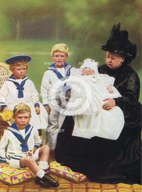 Queen Victoria (1819-1901) pictured with some of her great-grandchildren, at Osborne House on the Is Artist: Unknown
