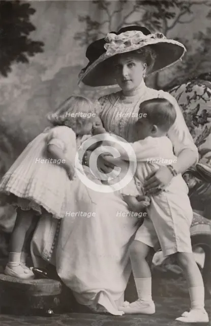 'Queen Victoria of Spain with Prince Alfonso, Princess Maria Christina and Princess Beatrice, 1911.  Creator: Frank Arthur Swaine.
