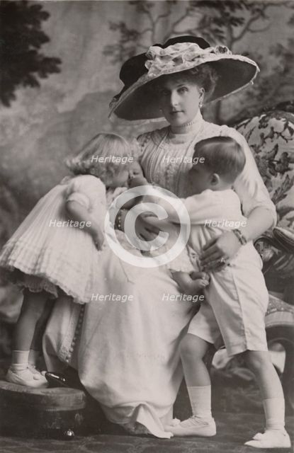 'Queen Victoria of Spain with Prince Alfonso, Princess Maria Christina and Princess Beatrice, 1911.  Creator: Frank Arthur Swaine.
