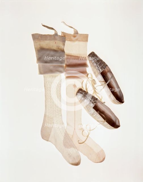 Queen Victoria's wedding shoes and stockings, 1840. Creator: Grundy & Sons.
