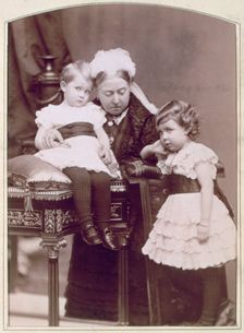 Queen Victoria with two of her grandchildren, April 1886. Creator: Alexander Bassano