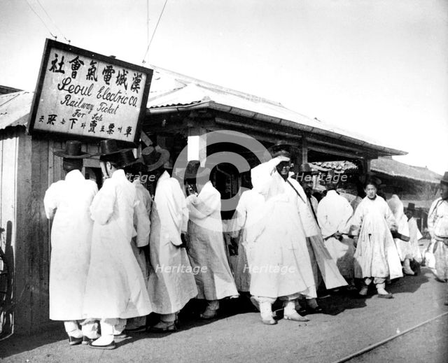 Queing for railway tickets, Seoul, Korea, 1900. Artist: Unknown