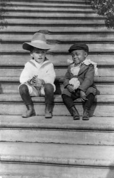Quentin Roosevelt and Roswell Newcomb Pinckney seated on steps, c1902 June 17. Creator: Frances Benjamin Johnston
