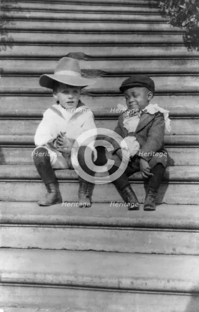 Quentin Roosevelt and Roswell Newcomb Pinckney seated on steps, c1902 June 17. Creator: Frances Benjamin Johnston.