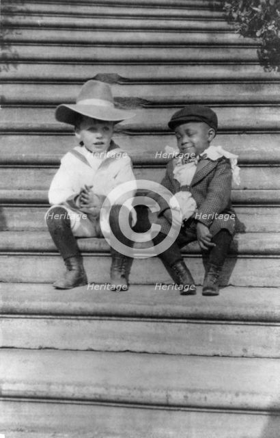 Quentin Roosevelt and Roswell Newcomb Pinckney seated on steps, c1902 June 17. Creator: Frances Benjamin Johnston.