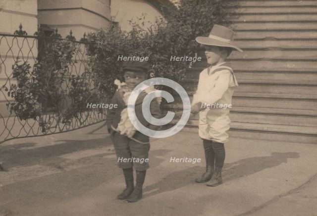 Quentin Roosevelt and Roswell Pinckney at play, c1902 June 17. Creator: Frances Benjamin Johnston.