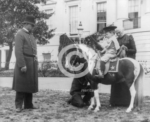 Quentin Roosevelt on pony in front of White House, 1900?. Creator: Frances Benjamin Johnston.