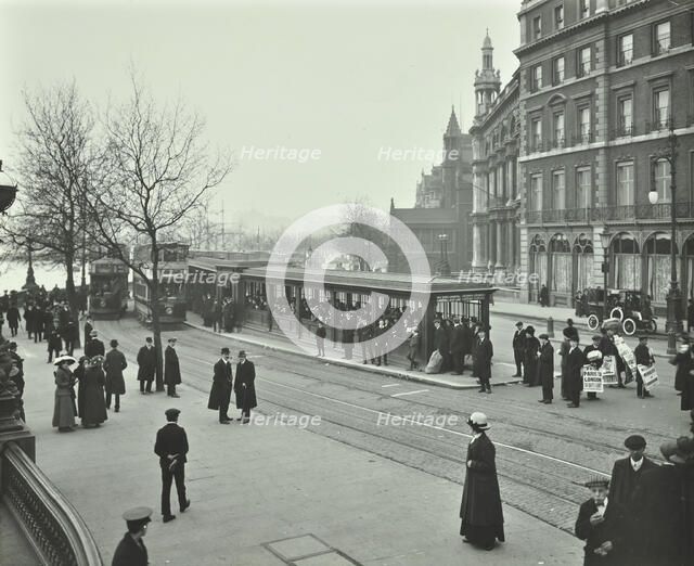 Queue of people at Blackfriars Tramway shelter, London, 1912.  Artist: Unknown.