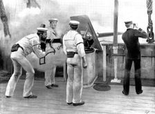 Quick firing practice with a six-pounder Hotchkiss Gun, 1898. Creator: Unknown
