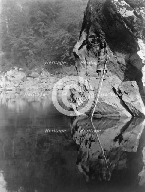 Quiet waters-Yurok, c1923. Creator: Edward Sheriff Curtis.