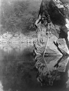 Quiet waters-Yurok, c1923. Creator: Edward Sheriff Curtis