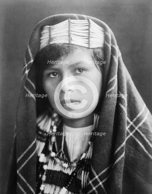 Quinault female head-and-shoulders portrait, facing slightly left, c1913. Creator: Edward Sheriff Curtis.