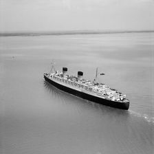 RMS Queen Elizabeth in the Solent approaching Southampton Water, Hampshire, 1949. Artist: Aerofilms