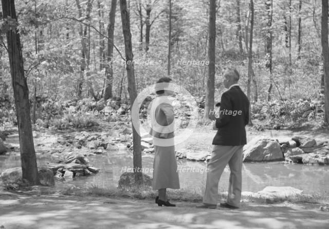 Rothbart, Albert, Mr., group, standing outdoors, between 1920 and 1935. Creator: Arnold Genthe.