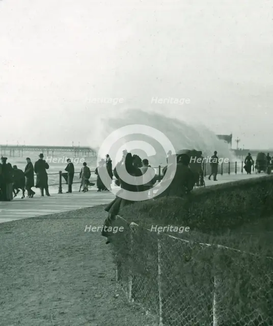 Rough sea over the promenade at Hastings, Sussex, late 19th-early 20th century. Creator: Unknown.