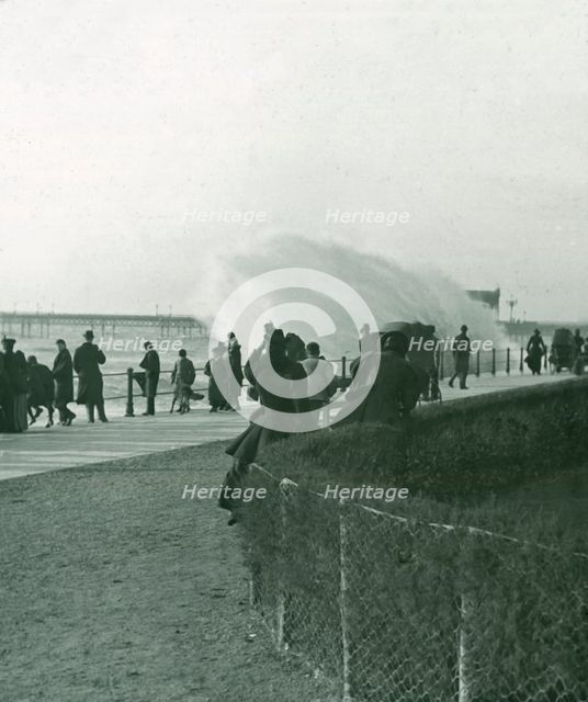 Rough sea over the promenade at Hastings, Sussex, late 19th-early 20th century. Creator: Unknown.