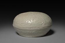 Round Covered Box with Floral Scrolls in Relief: Qingbai type Ware, 1300s. Creator: Unknown