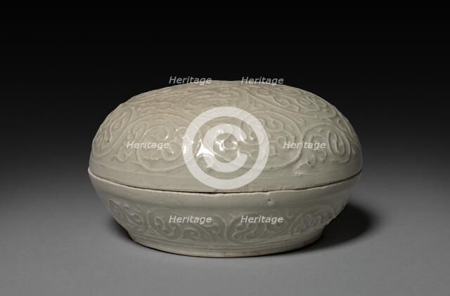Round Covered Box with Floral Scrolls in Relief: Qingbai type Ware, 1300s. Creator: Unknown.