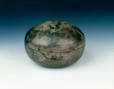 Round silver box with two incised phoenixes, Yuan dynasty, China, 1279-1368. Creator: Unknown