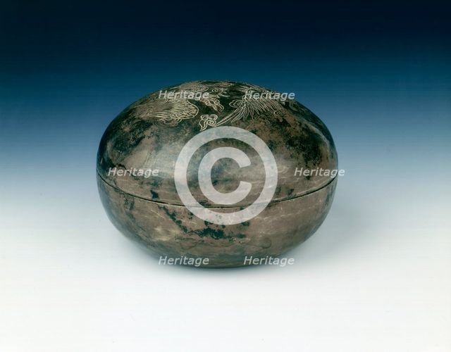 Round silver box with two incised phoenixes, Yuan dynasty, China, 1279-1368. Creator: Unknown.