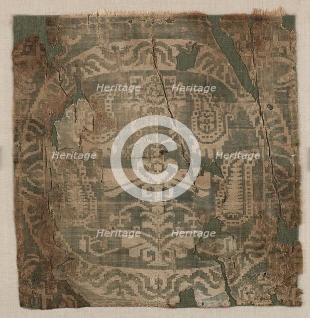 Roundel with angular palmette tree, from a tunic, 650-850. Creator: Unknown.