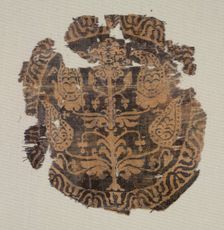 Roundel with curvilinear palmette tree, from a tunic, 600-850. Creator: Unknown