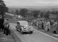 Rover 4-door saloon of FD Cooper competing in the South Wales Auto Club Welsh Rally, 1937 Artist: Bill Brunell