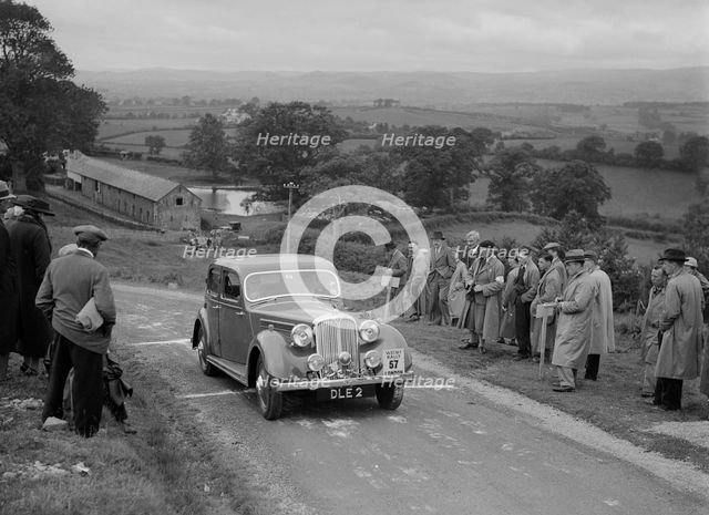 Rover 4-door saloon of FD Cooper competing in the South Wales Auto Club Welsh Rally, 1937 Artist: Bill Brunell.