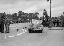 Rover 4-door saloon of FD Cooper competing in the South Wales Auto Club Welsh Rally, 1937 Artist: Bill Brunell