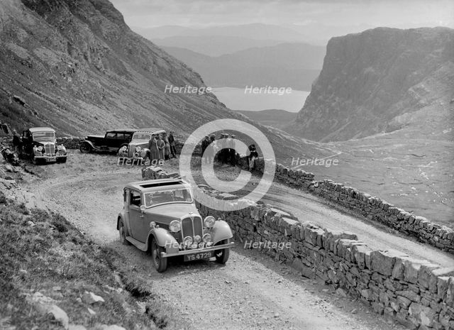 Rover 4-door saloon of IH Mackay competing in the RSAC Scottish Rally, 1936. Artist: Bill Brunell.