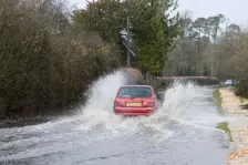 Rover Metro driving through floods at Beaulieu 2008