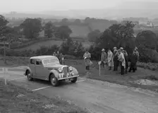 Rover saloon of WJH Davies competing in the South Wales Auto Club Welsh Rally, 1937 Artist: Bill Brunell