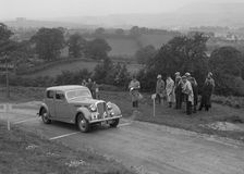 Rover saloon of WJH Davies competing in the South Wales Auto Club Welsh Rally, 1937 Artist: Bill Brunell