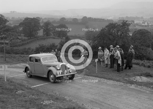 Rover saloon of WJH Davies competing in the South Wales Auto Club Welsh Rally, 1937 Artist: Bill Brunell.