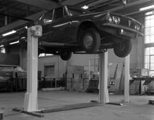 Rover P6 on a Laycock 4 post wheel free lift, Sheffield, South Yorkshire, 1968. Creator: Michael Walters