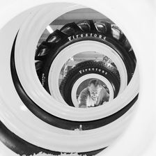 Row of Firestone tyres at the Royal Smithfield Show at Earls Court, London, 1956. Creator: John Gay