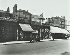 Row of shops including the West London Workshops for the Blind, London, 1913