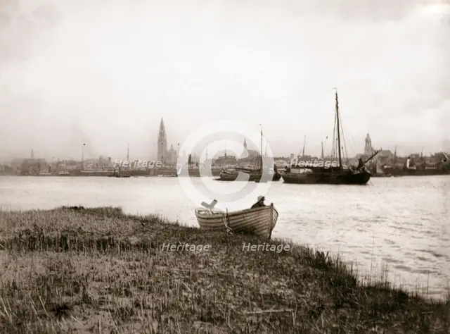 Rowing boat by a canal, Rotterdam, 1898.Artist: James Batkin