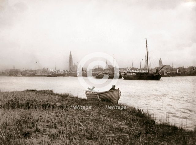 Rowing boat by a canal, Rotterdam, 1898.Artist: James Batkin