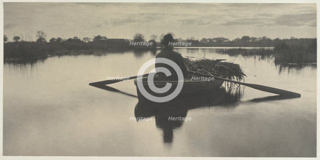 Rowing Home the Schoof-Stuff (from Life and Landscape on the Norfolk Broads, 1886, plate XXI), 1886. Creator: Peter Henry Emerson (British, 1856-1936); Sampson Low, Marston, Seale and Riverton (with T.F. Goodall).