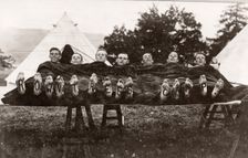 Rowntree boys at camp lie on a trestle,Coniston, Cumbria, summer 1913